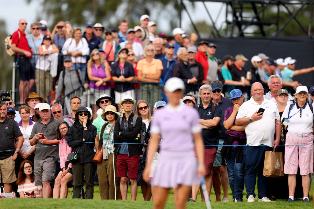 Fans in the grandstand watch Charley Hull in action in the AIG Women's Open
